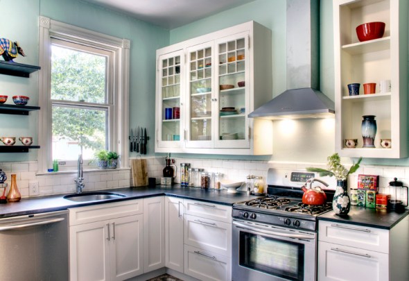 The client found these glass doors at a local architectural salvage shop. It was quite easy to make these lovely cabinets out of them. This kitchen is in West Philly.